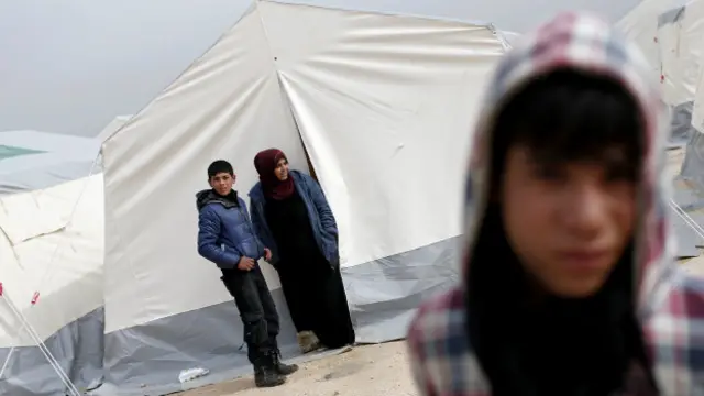 Біженці в таборі для мігрантів у сирійському місті Баб-ель-Салам