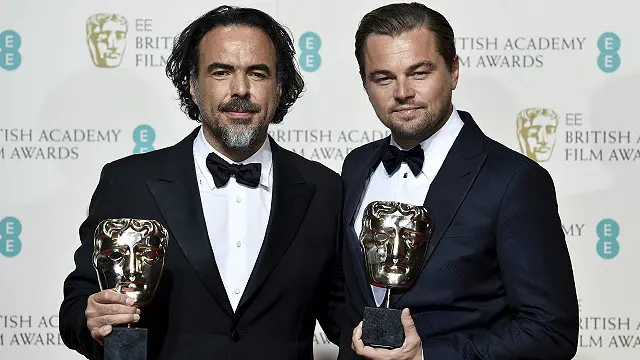 فيلم دي كابريو (يمين) وإيناريتو اكتسح جوائز البافتا