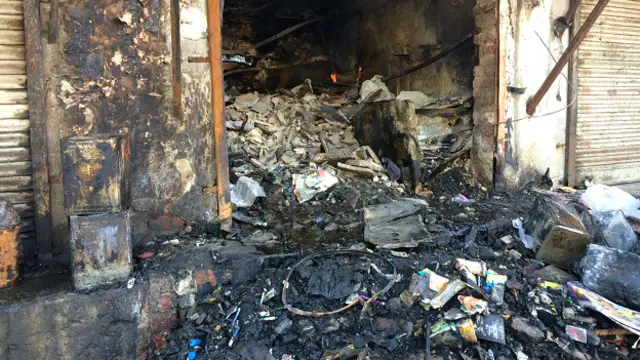 रोहतक में तोड़ी गई एक दुकान.