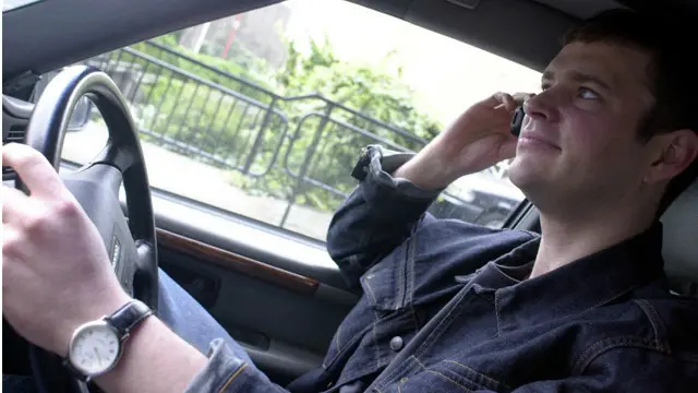 Телефон за кермом