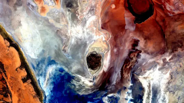 Una imagen llena de colores que se entremezclan como la acuarela