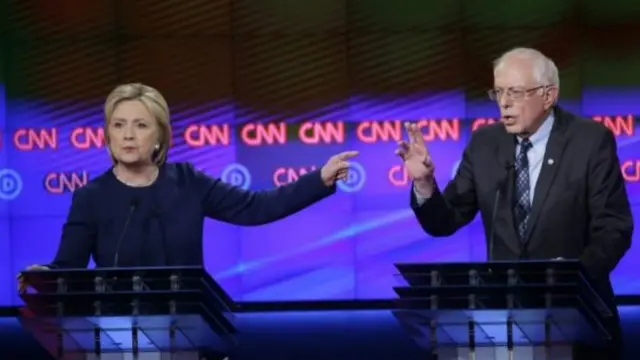 Bà Clinton và ông Sanders tranh luận gay gắt hôm Chủ Nhật