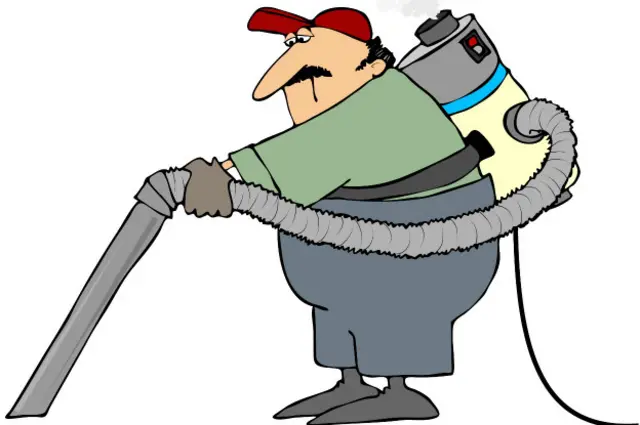Человек с пылесосом