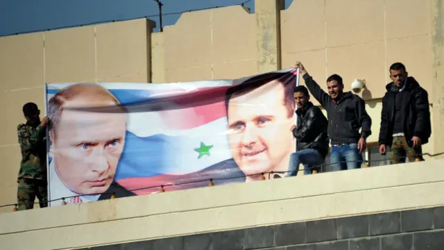 Плакат с Путиным и Асадом в Сирии