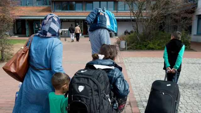Cирийские беженцы, прибывшие в Германию. 4 апреля 2016 г.