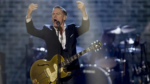 Брайан Адамс