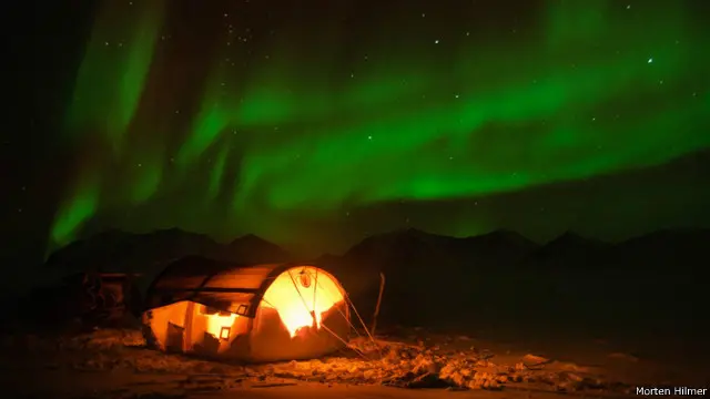 Northern lights (Cahaya Utara) di atlas timurlaut Greenland.
