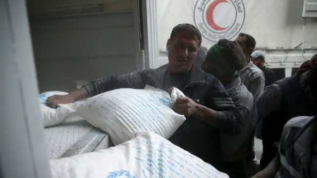 الصليب الأحمر الدولي والهلال الأحمر السوري يتعاونان في توزيع المعونات