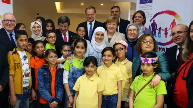 Беженцы и Меркель