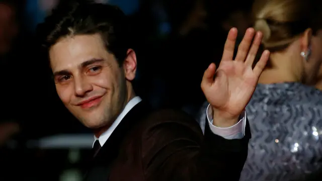 منح كزافييه دولان جائزة مناصفة مع المخرج المخضرم جان لوك غودار في مهرجان كان عام 2014 