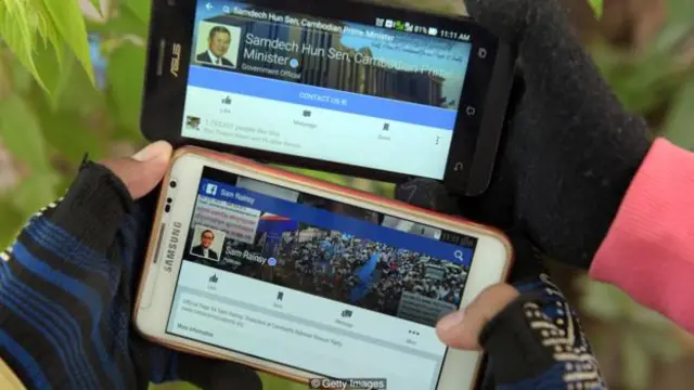 Facebook của ông Hun Sen và lãnh đạo đối lập Sam Rainsy (Ảnh: Getty Images)