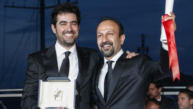 Каннский кинофестиваль: иранский актер Шахаб Хоссейни и режиссер Асгар Фархади .