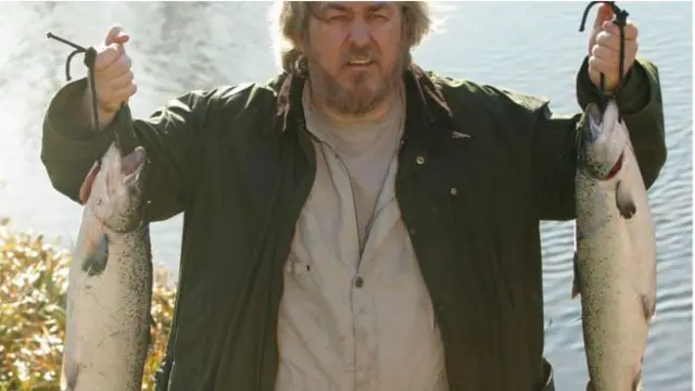 Мужчина с рыбой