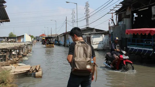 Genangan air akibat banjir rob di Blok Empang, Muara Angke.