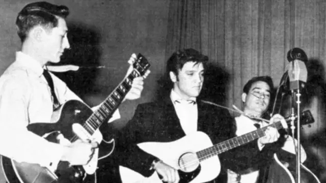 سكوتي مور التقى بريسلي لأول مرة عام 1954 في اختبار عمل باستوديو وظل يعمل طوال 14 عاما