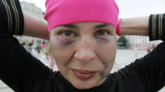 Побита жінка