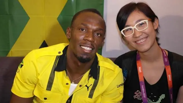 严小琰与美国田径选手博尔特在2012伦敦奥运