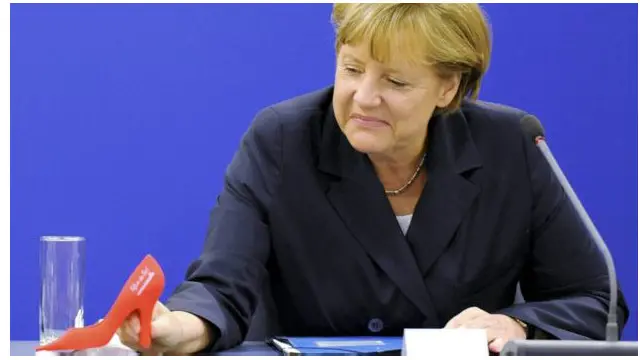 На туфлі Меркель преса уваги не звертала