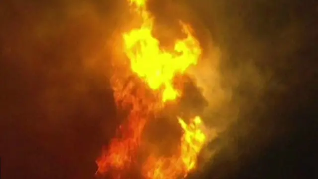 بعض السكان اضطروا للفرار من منازلهم بسبب الحريق الهائل للغابات جنوب كاليفورنيا