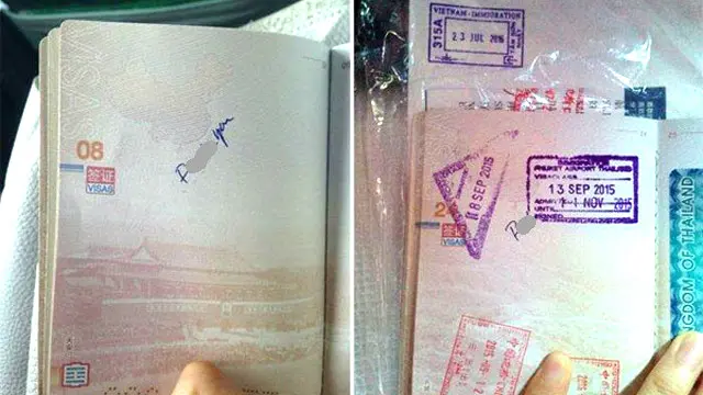 Hai trang số 8 và 24 trong cuốn hộ chiếu có dòng chữ 'F*ck you' viết tay