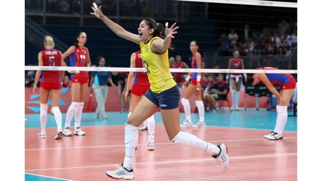 Natalia Pereira of Brazil celebrates the win over Russia in the women's volleyball quarter-finals in London. Elsa Garrison / Getty Images