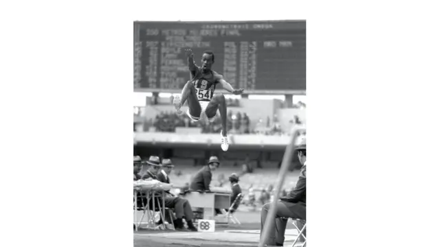 Bob Beamon of the USA breaks the long jump world record during the 1968 Olympic Games in Mexico City. Tony Duffy / Getty Images