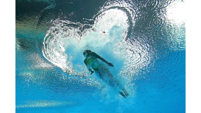 Christina Loukas of the United States competes in the women's 3m springboard diving semi-final at the London 2012 Olympic Games. Al Bello / Getty Images
