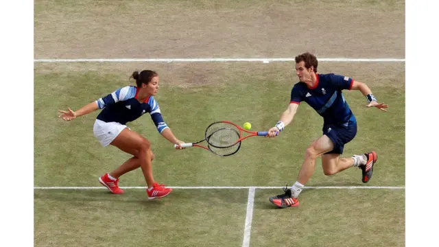 Laura Robson and Andy Murray of Great Britain compete against Christopher Kas and Sabine Lisicki of Germany in their mixed doubles tennis semi-final match at the London Olympics.Elsa Garrison / Getty Images Elsa Garrison / Getty Images