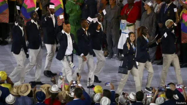 Kontingen pengungsi berlaga di bawah bendera Olimpiade.