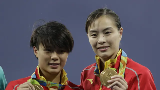 吴敏霞和搭档施廷懋为中国跳水队在本届奥运会上摘得首金。