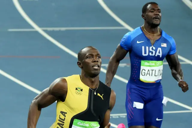 博尔特和加特林在冲刺后