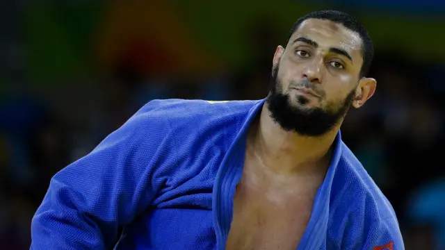 ڈسپلنری کمیشن کے مطابق اس کھلاڑی کا رویہ کھیل اور اولمپک کی دوستانہ اقدار کے منافی تھا