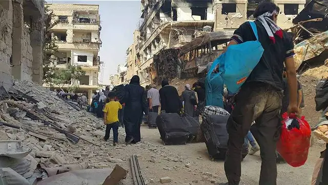 د سوریې رسنۍ وايي، له داریا نه ۷۰۰ وسله وال او ۴ زره ولسي وګړ په وتلو دي