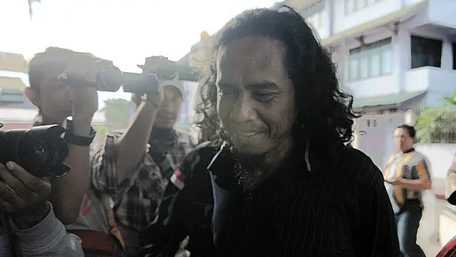 Basri beberapa saat setelah ditangkap polisi.