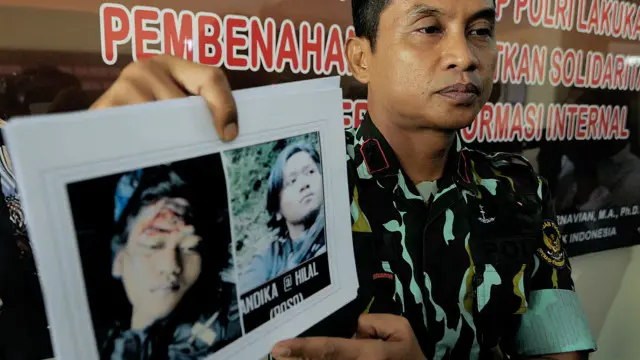 Kepolisian memperlihatkan foto Andika, 'anak buah' Basri, yang ditemukan tewas hanyut di sungai.