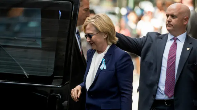 希拉里在9/11紀念儀式中離開