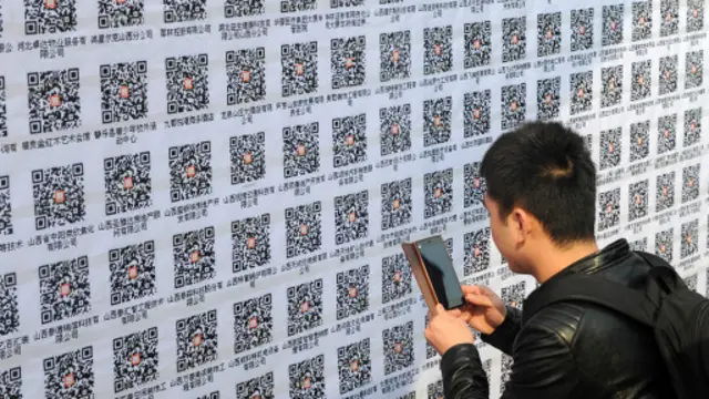 微信二维码在中国非常普遍，比传统的名片更受欢迎（图片来源：Getty Images）
