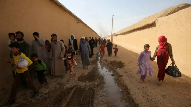 يُعتقد بأن نحو 1.5 مليون مدنيٍّ لا يزالون في الموصل