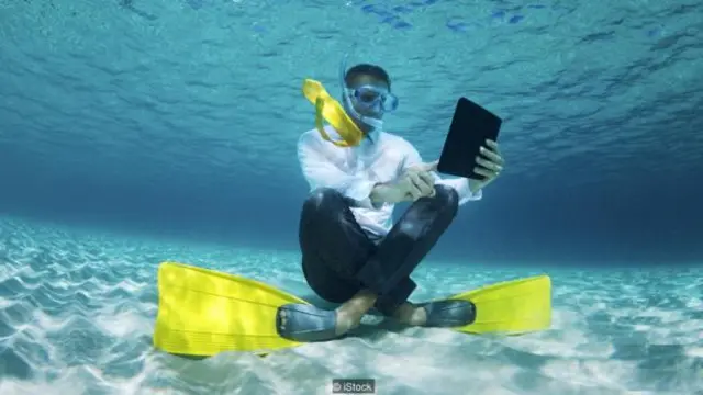 Randstad于2014年调查的员工中有42%感觉不得不在度假时处理工作。（图片来源：iStock）