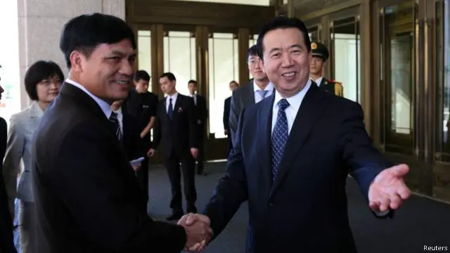 孟宏偉(右）當選新一任國際刑警組織（Interpol）主席