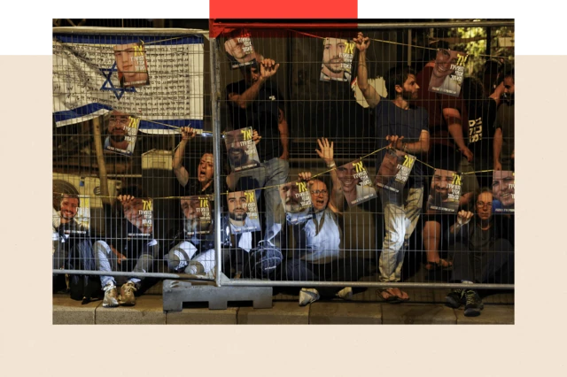 People take part in a protest demanding the release of all hostages