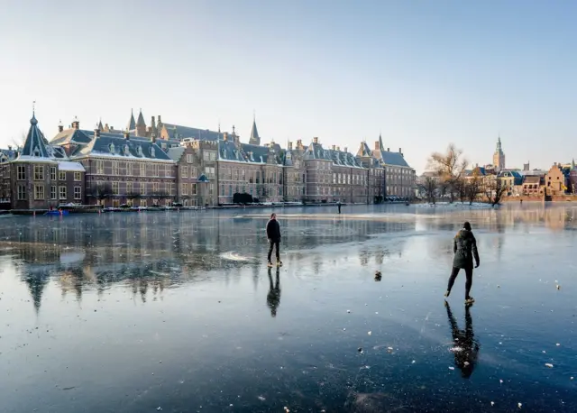 Skaters on the Hofvijver in The Hague, The Netherlands, 12 February 2021
