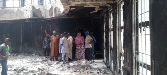 Foto of di Kogi State House of Assembly wey fire burn