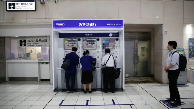 People using a Mizuho ATM