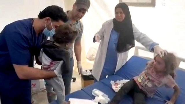 O momentojogo de tiro jogo de tiroque irmãs se reencontram após ataque aéreojogo de tiro jogo de tiroIsraeljogo de tiro jogo de tiroGaza