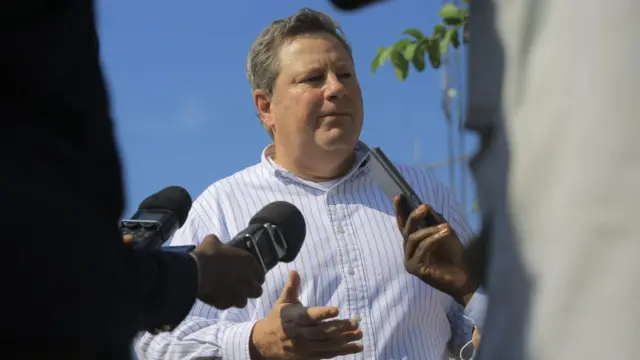 The US ambassador to Democratic Republic of Congo (DRC) Mike Hammer, 56, speaks to journalists on October 5, 2020 during his visit in the Eastern violence-torn region of Beni.
