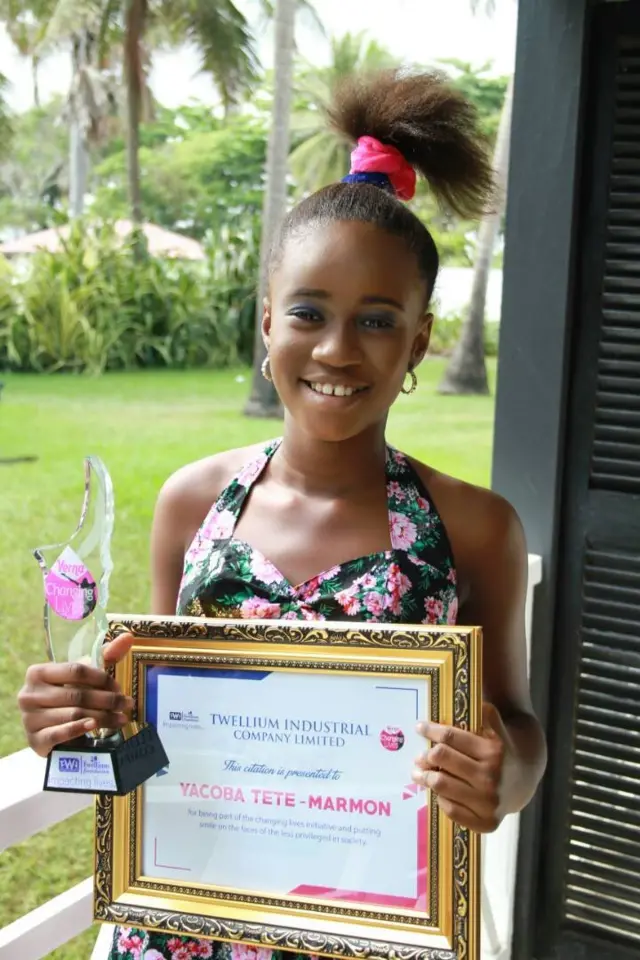 Yacoba, with her award and certificate