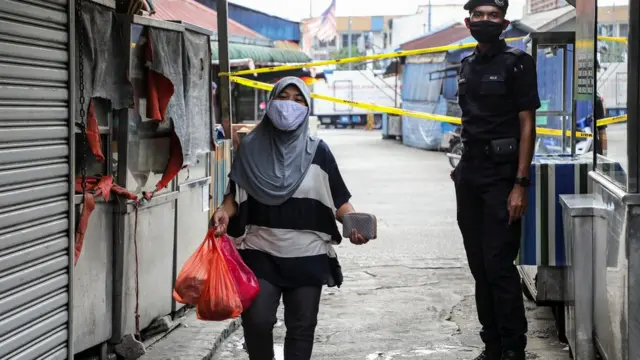 virus corona, malaysia, wni, tki