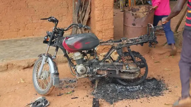 Burnt motorcycle from di attack