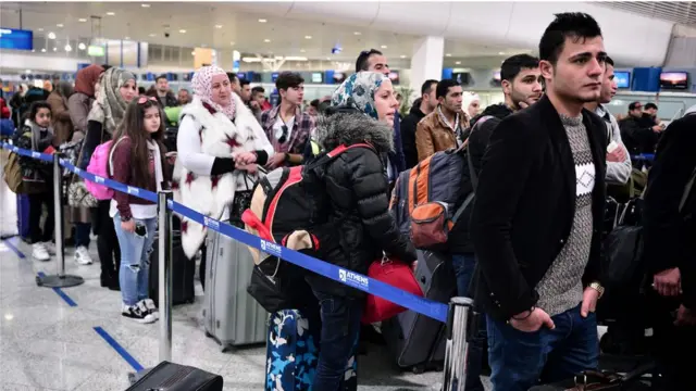 Refugiados sírios no aeroportoslots que dao bonus gratisAtenas, Grécia